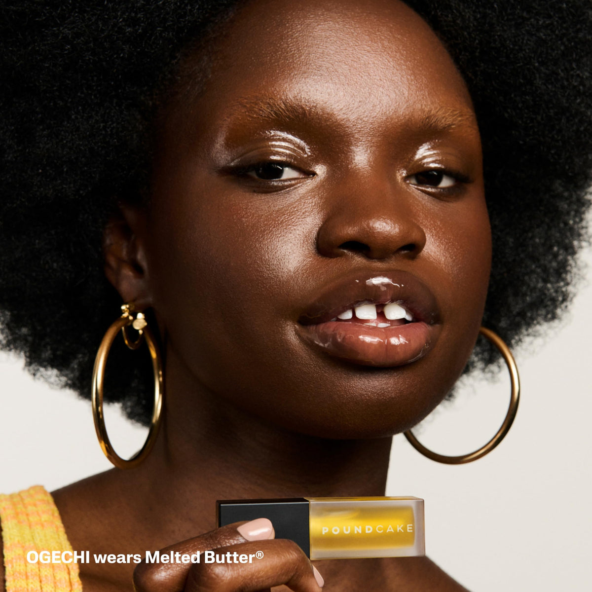 POUND CAKE in daytime lifestyle use, wearable gloss adds hydrated shine on the go