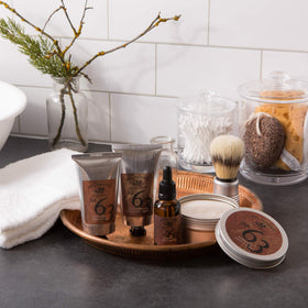 Pre de Provence scale comparison soap next to coin showing compact tin size for travel