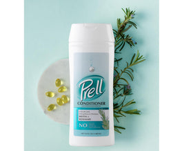 Prell conditioner texture on fingers showing lightweight hydration benefit