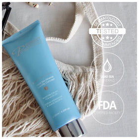 Premier applying cream to hand demonstrating immediate absorption benefit
