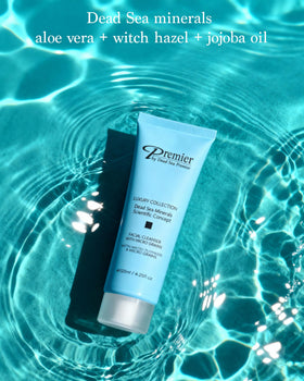 Premier bottle held in hand showing 4.4 fl oz size for travel and daily routine