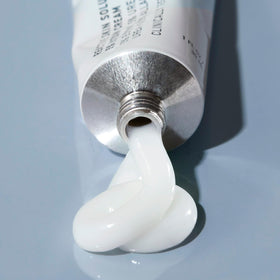 Prequel face application in natural light showing calm, hydrated skin