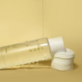 PRETTYSKIN 250ml bottle beside common items showing size and value