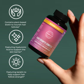 Hand holding Primal Harvest bottle to show scale and convenient daily dosing