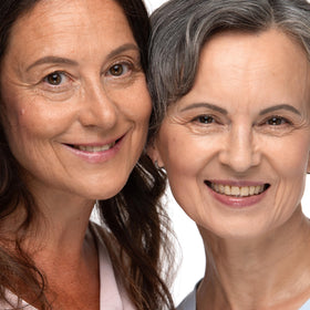Prime Prometics lifestyle shot at mirror showing quick, flattering daily brow grooming