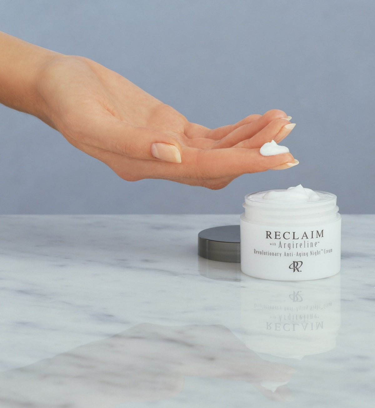 Principal Secret jar with retail box on surface promoting complete skincare routine
