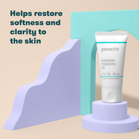 Proactiv in-use spot treatment on fingertip targeting blemish for quick relief