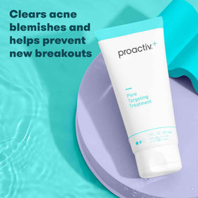 Proactiv 3 oz tube next to everyday items to show travel-friendly size