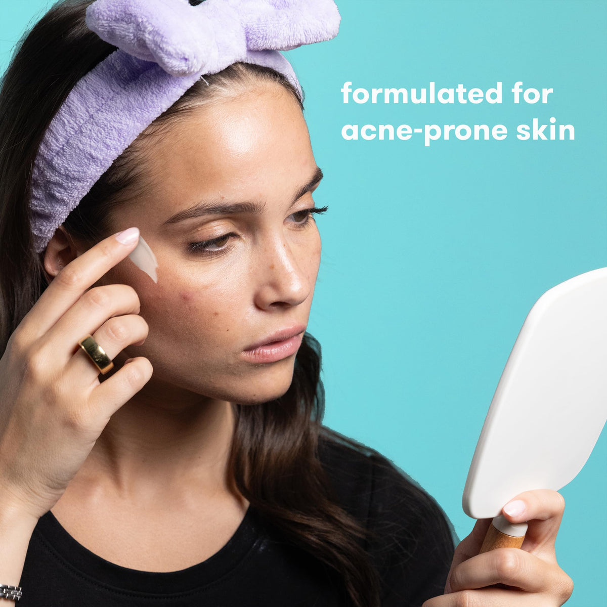 proactiv applying serum to cheek demonstrating targeted spot treatment