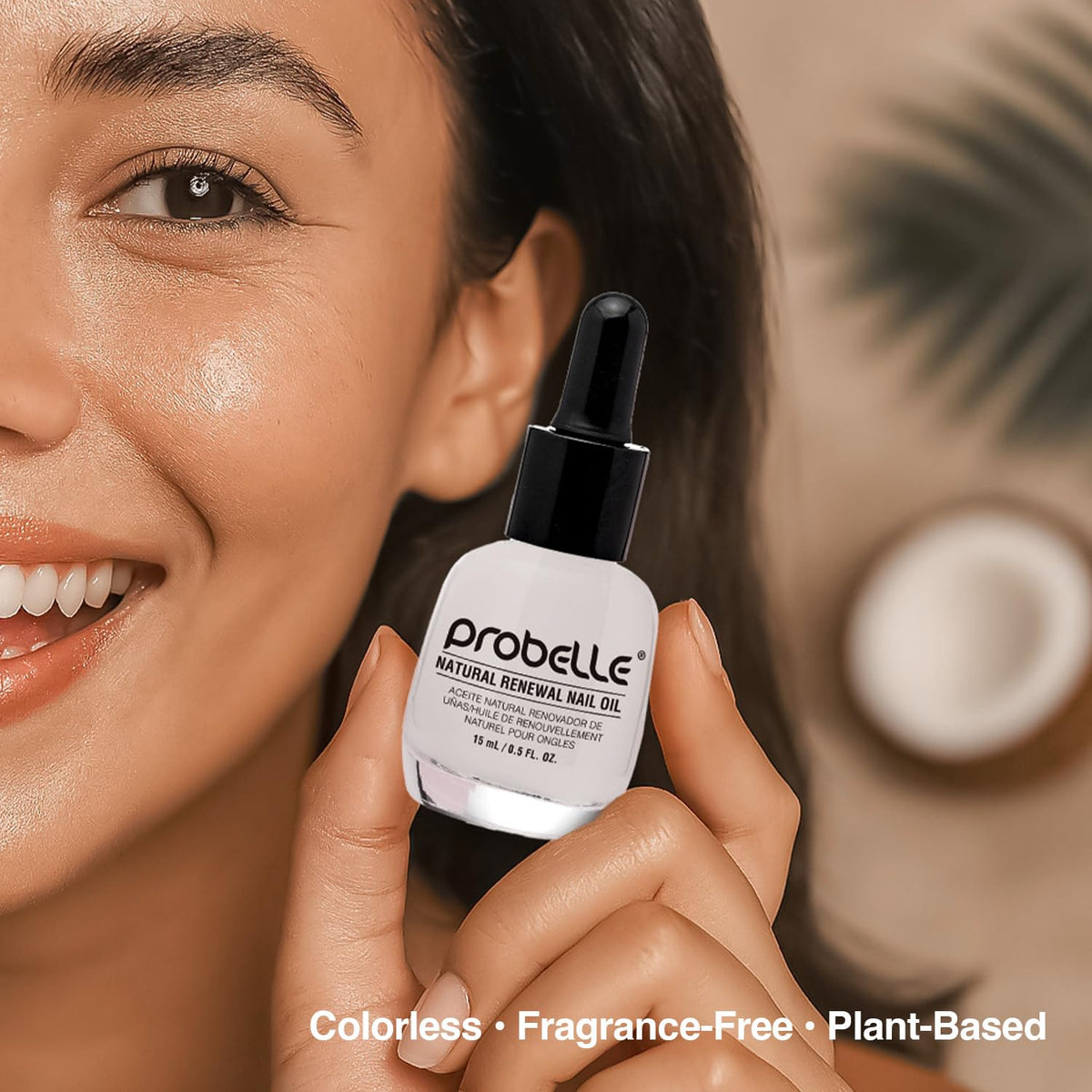Probelle closeup of dropper dispensing oil highlighting smooth absorption benefit