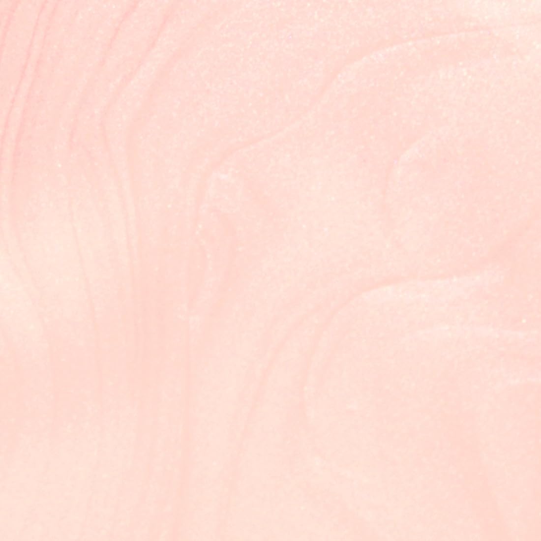 Peach pearl swatch on nail wheel showing Probelle color correction