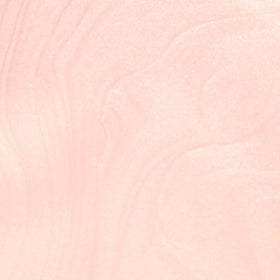 Peach pearl swatch on nail wheel showing Probelle color correction
