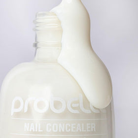 Probelle bottle next to coin showing compact size and scale benefit