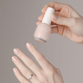 Drop of polish on white surface showing Probelle silky texture benefit
