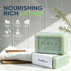 ProBliva soap next to hand for scale showing bar size and easy grip