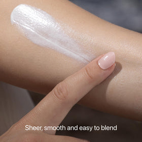 Project Reef applying lotion on arm demonstrating even coverage benefit