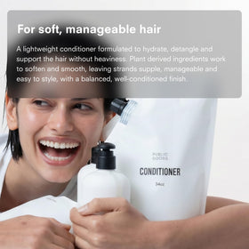 Public Goods conditioner in shower applied to hair showing detangling benefit