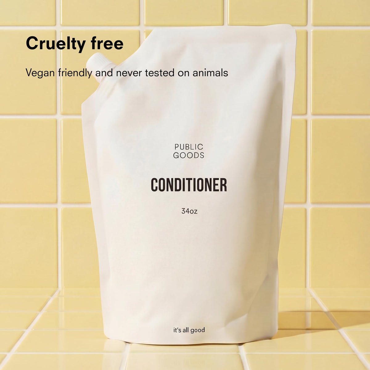 Public Goods conditioner texture close-up demonstrating creamy moisturizing benefit