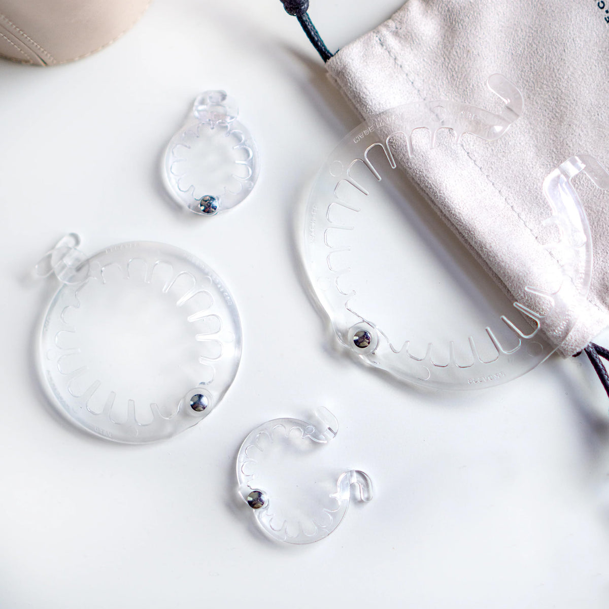 PuffCuff mini and teeny next to ruler showing scale for precise size selection