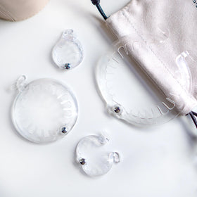 PuffCuff mini and teeny next to ruler showing scale for precise size selection