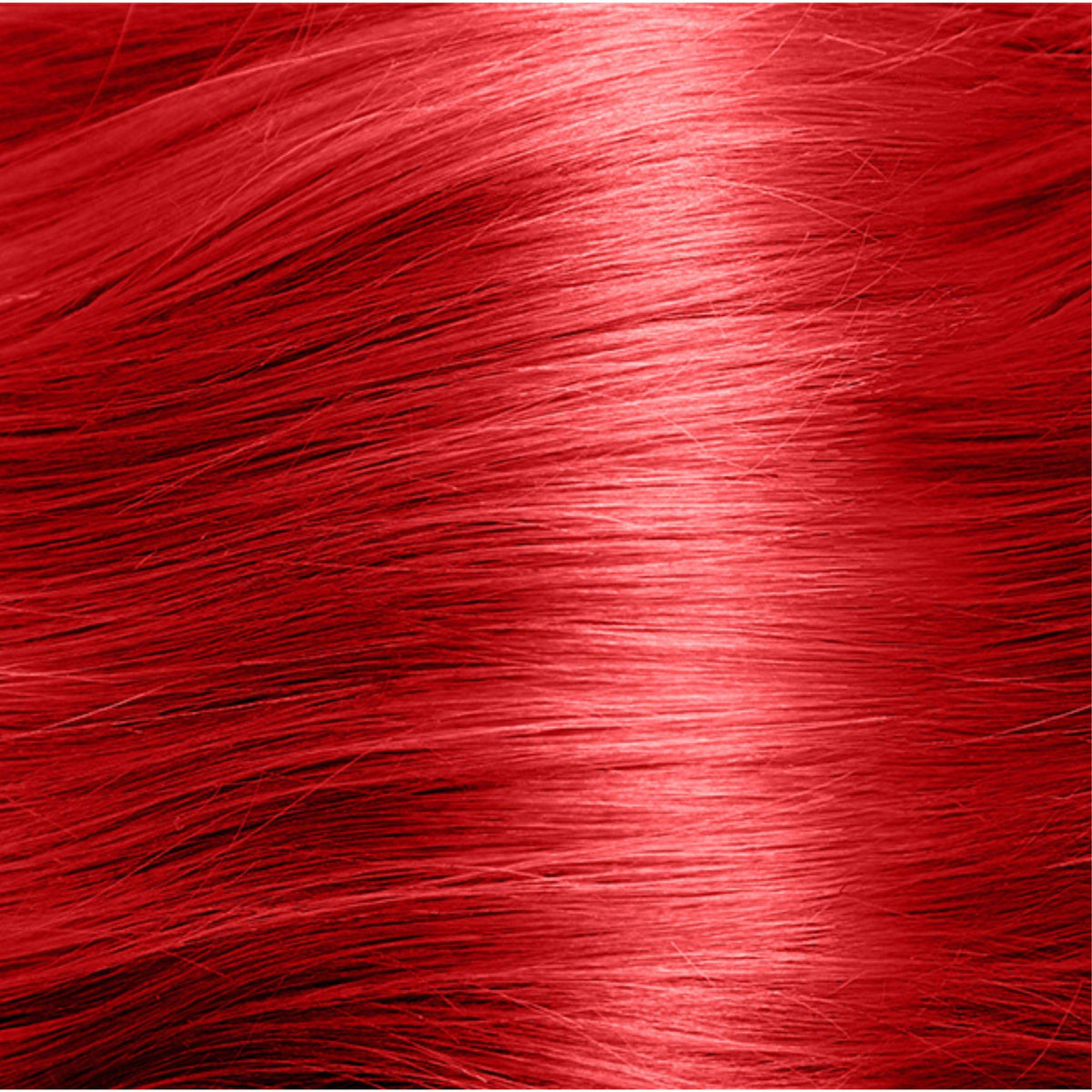 Punky styled red hair in lifestyle shot showing salon-like shine benefit