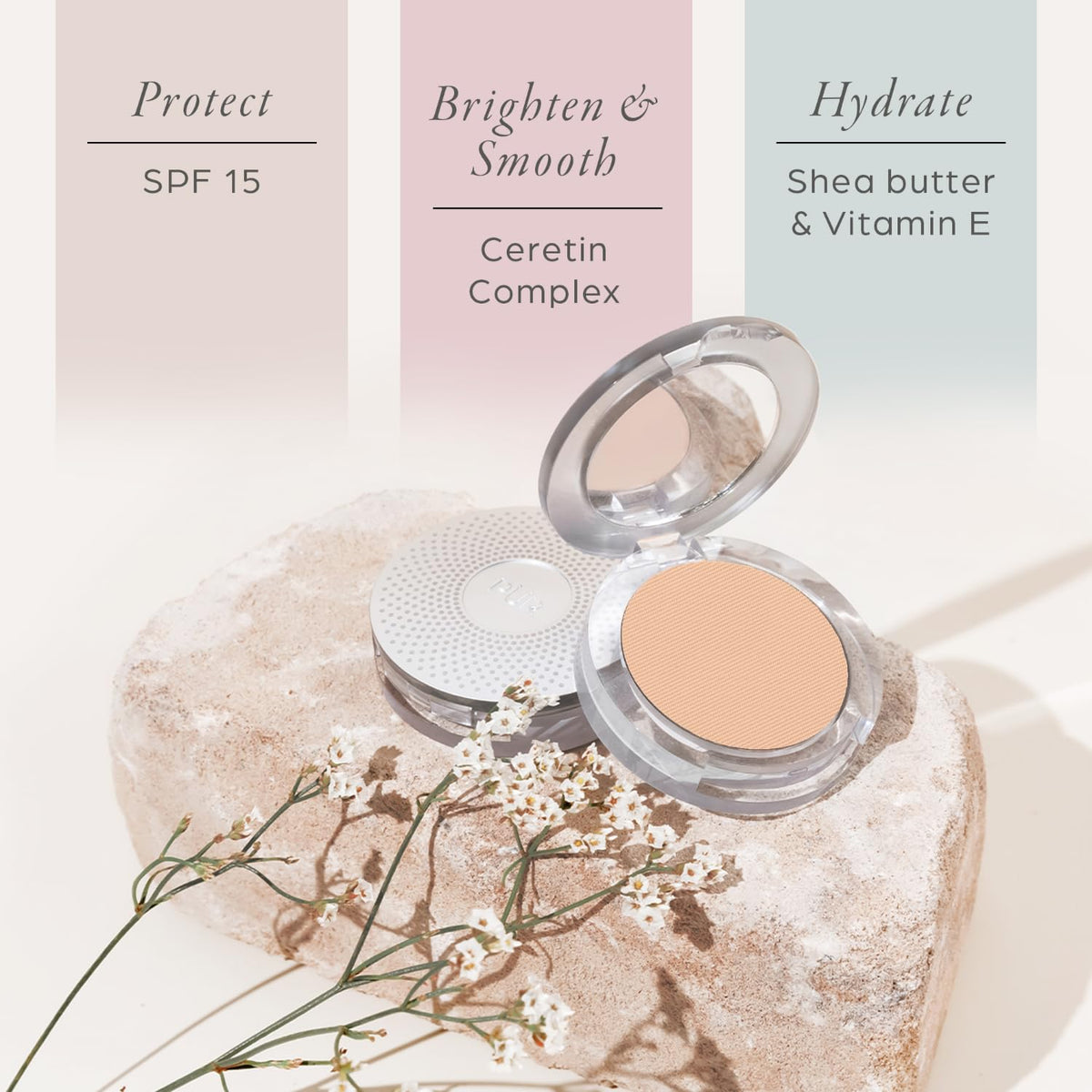 PÜR MINERALS compact held in hand to show size and easy portability benefit