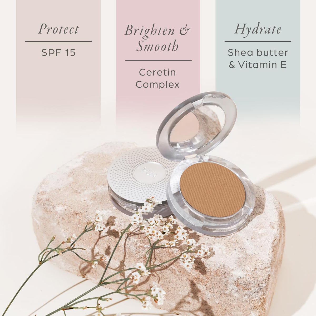 PÜR MINERALS compact held in hand to show size and easy touch-up benefit