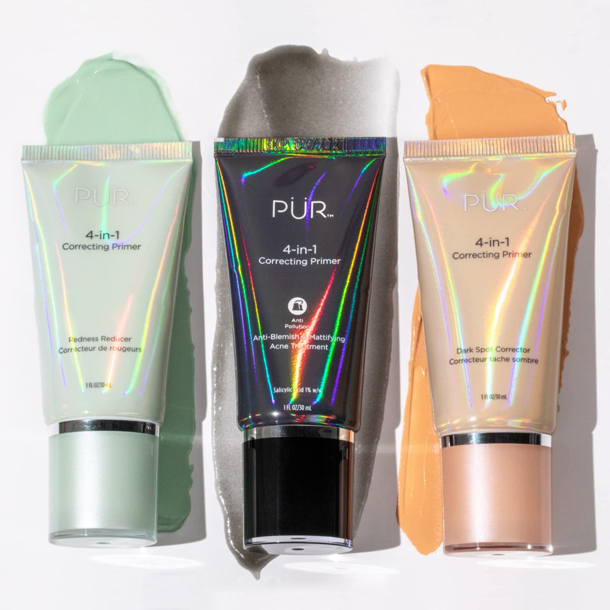 PÜR MINERALS primer applied on fingers demonstrating easy blending and redness reduction benefit