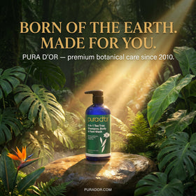 PURA D'OR bottle beside travel items showing space-saving benefit