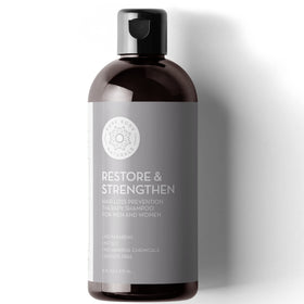 Pure Body Naturals front packaging showing bottle and woodsy scent benefits