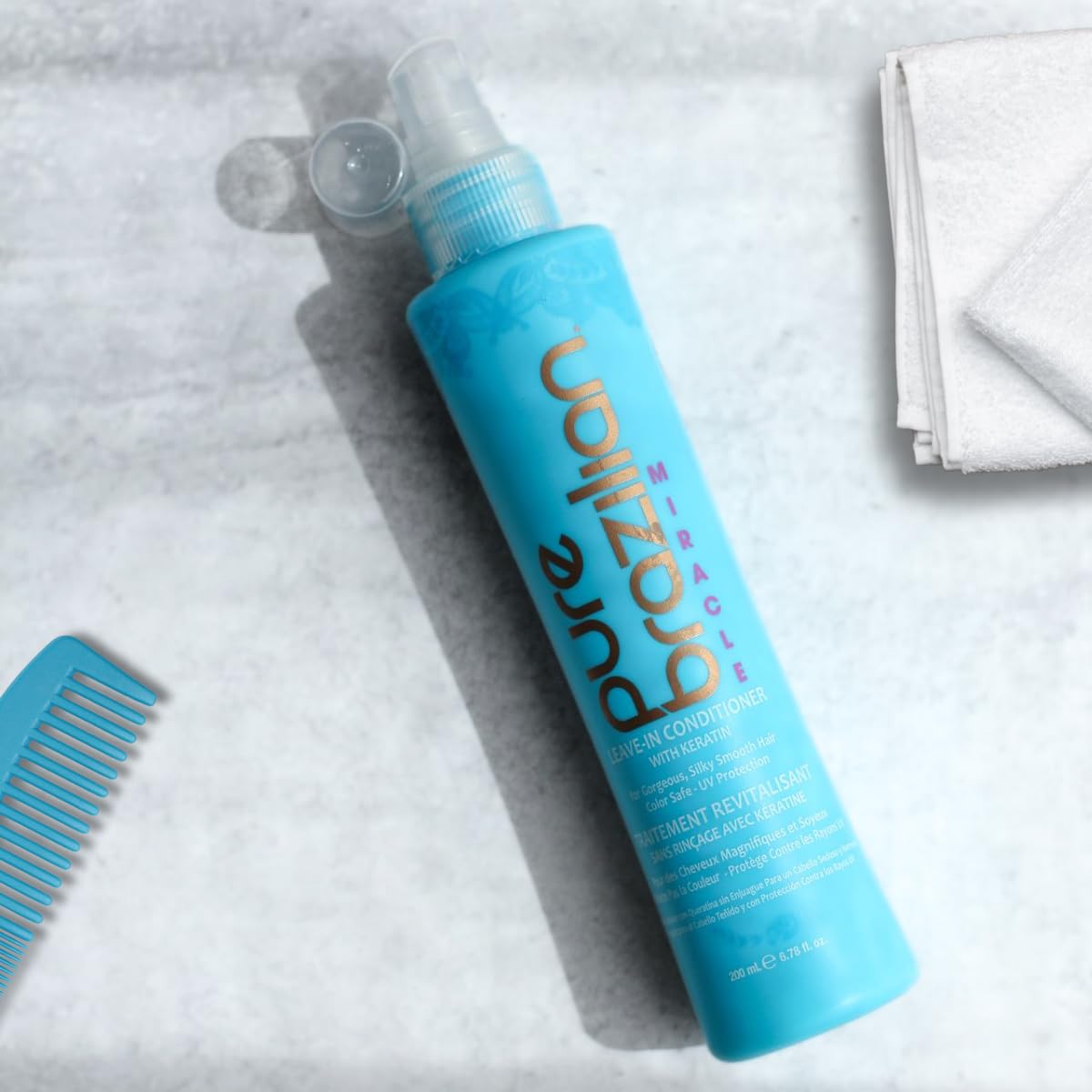 Pure Brazilian next to a 200ml scale to show size and travel-friendly benefit