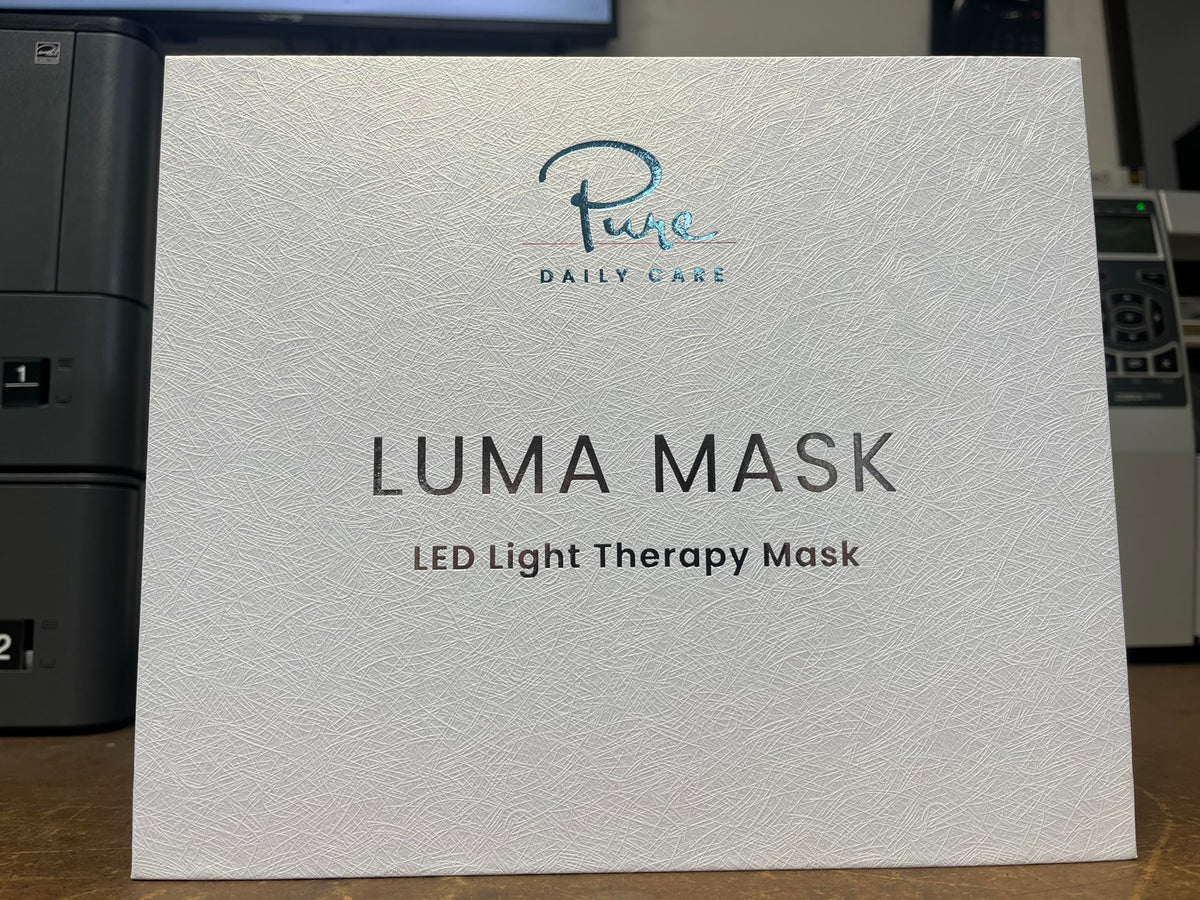 Pure Daily Care mask held in hand to show compact scale and portability benefit