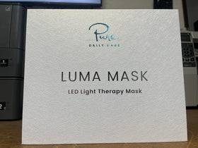 Pure Daily Care mask held in hand to show compact scale and portability benefit