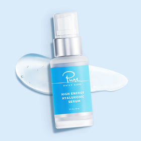 Pure Daily Care applying serum to face for faster absorption and immediate softness