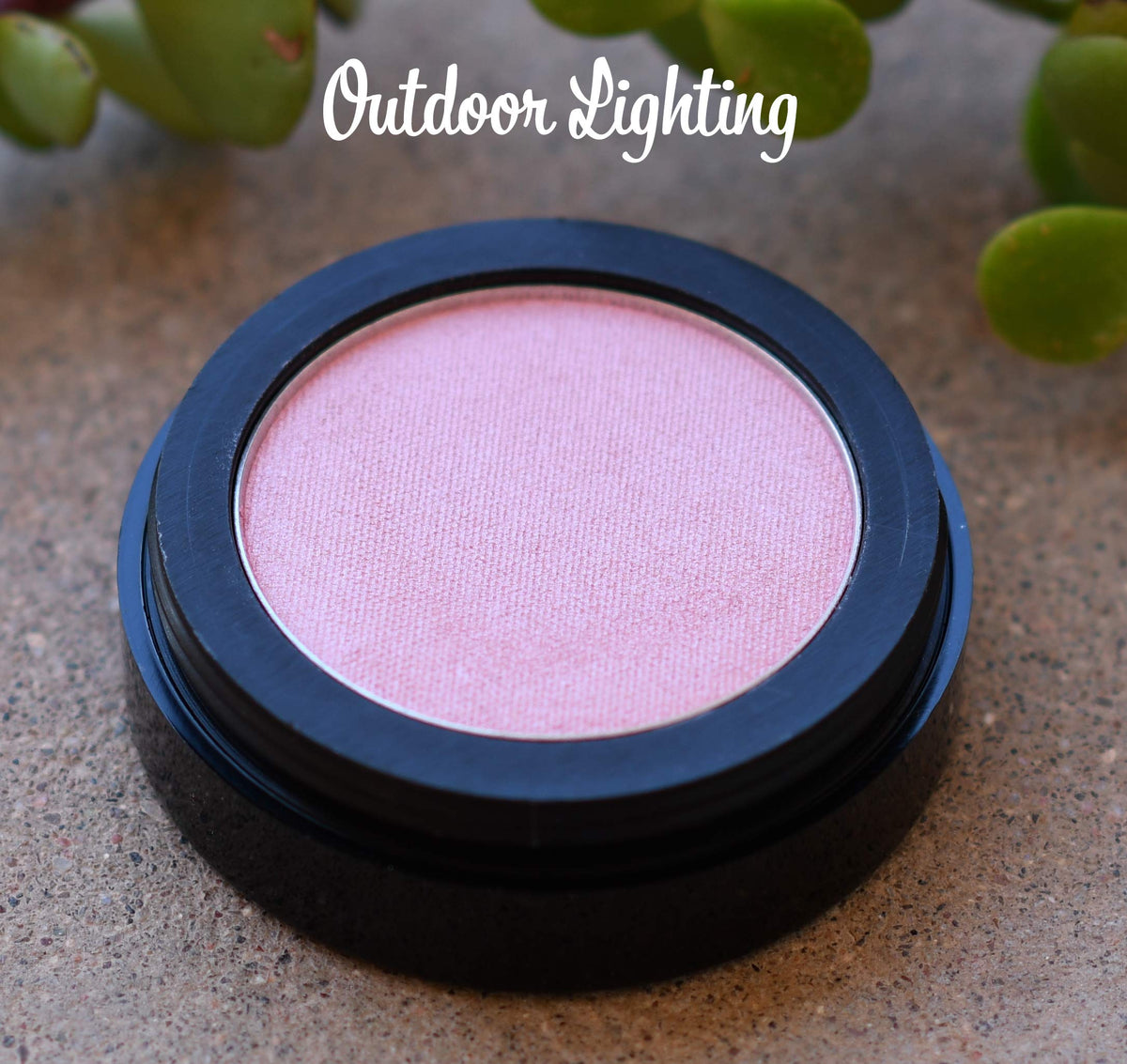 Pure Ziva brush swatch on skin demonstrating buildable shimmer and glow