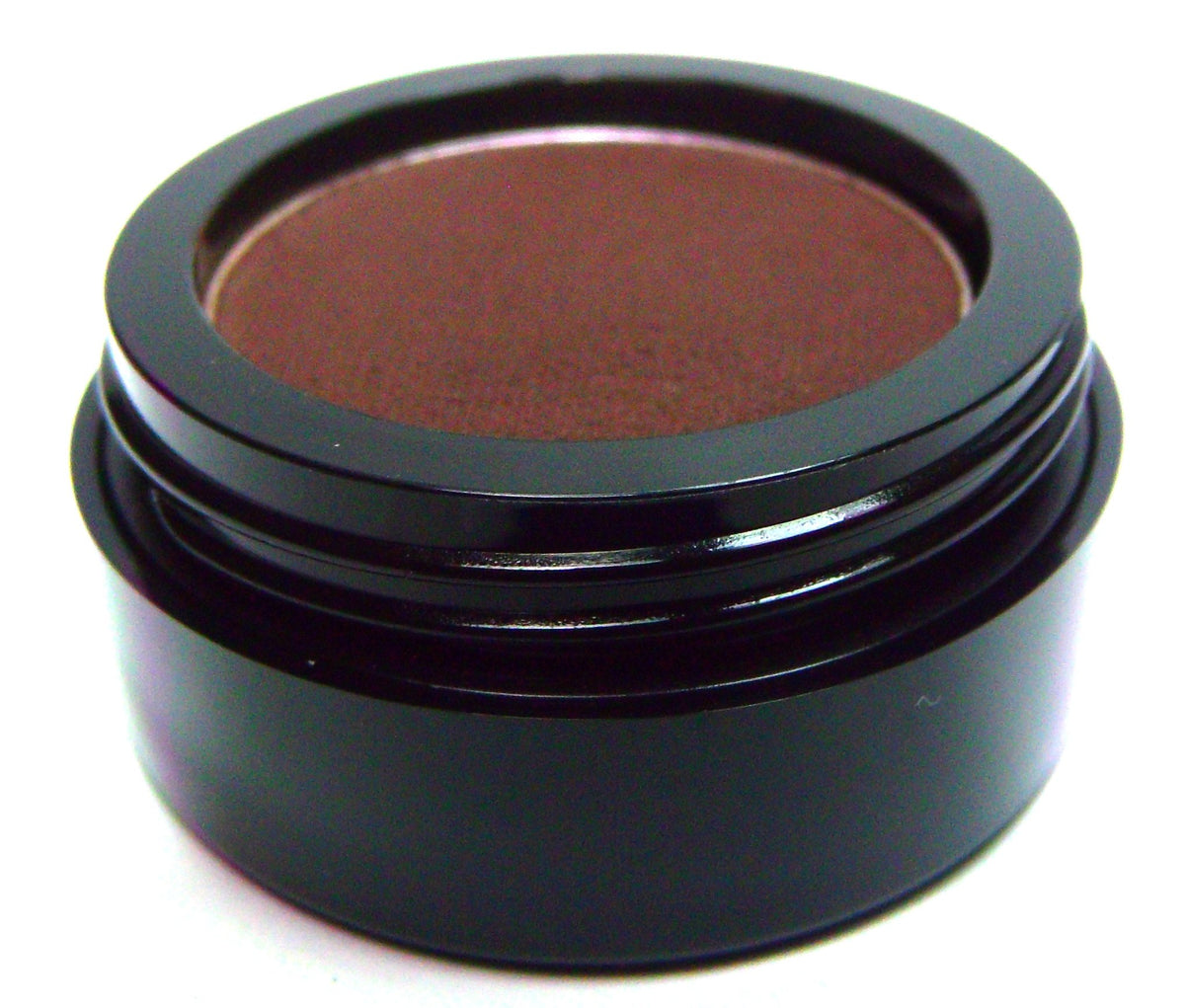 Pure Ziva front compact showing matte chocolate truffle cake, easy travel use
