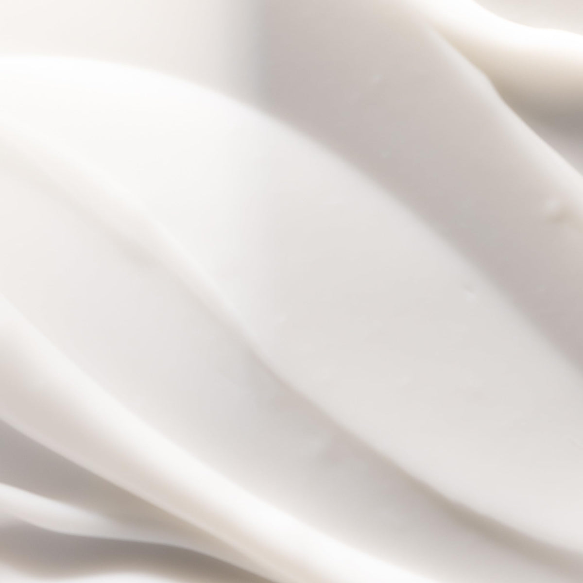 Pureology applying conditioner to midlengths and ends for targeted moisture