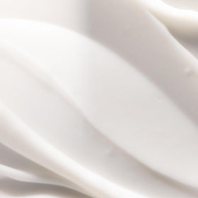 Pureology applying conditioner to midlengths and ends for targeted moisture