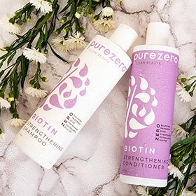 Purezero shampoo and conditioner being applied in shower for manageability
