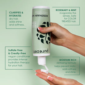Purezero bottles held in hand for scale showing travel-friendly 12 oz size