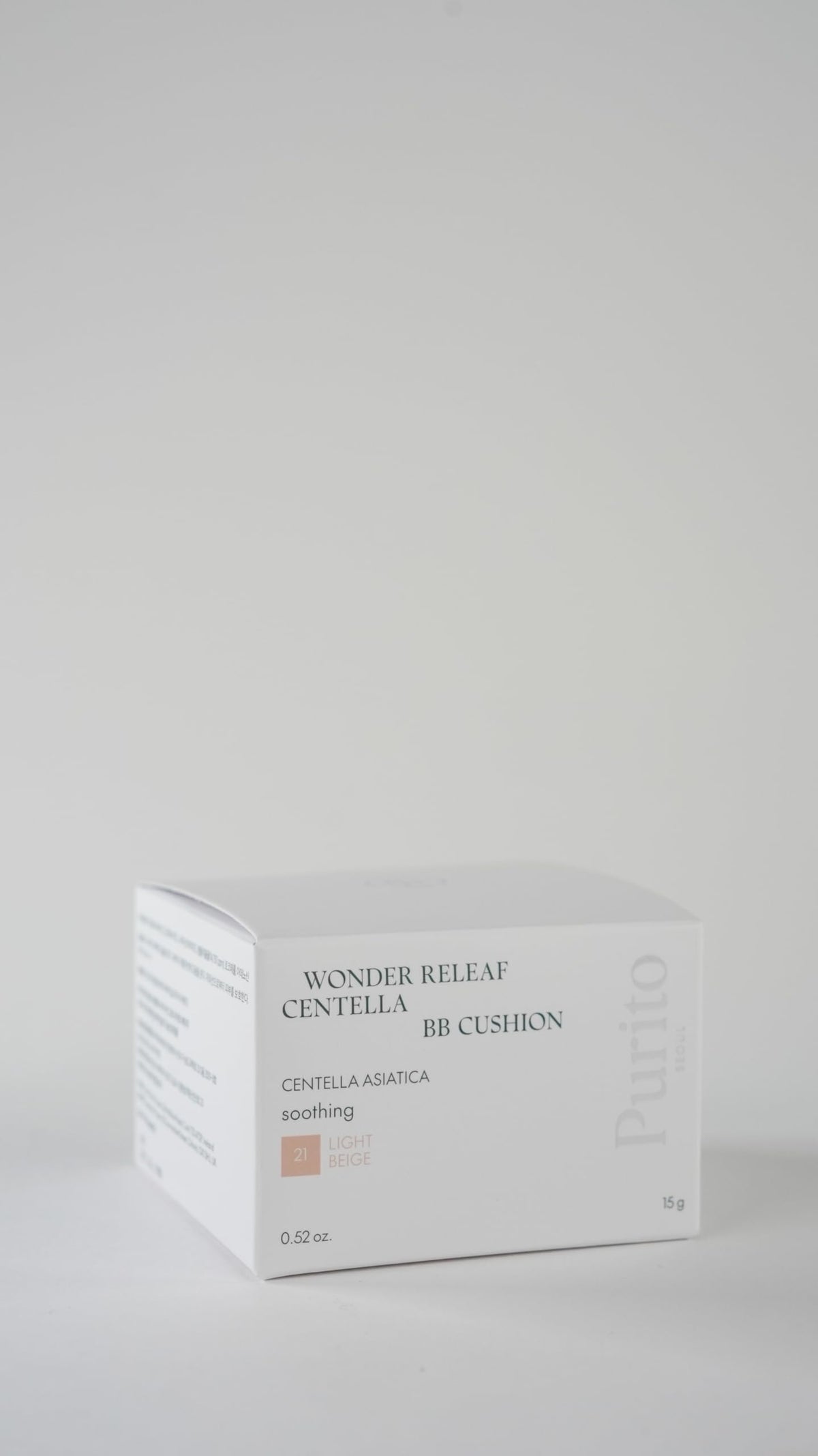 PURITO compact inside a handbag in lifestyle setting, convenient touch-up benefit