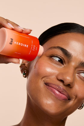 PURPOSEFUL SKINCARE Heroine toner on bathroom shelf styled for everyday routine appeal