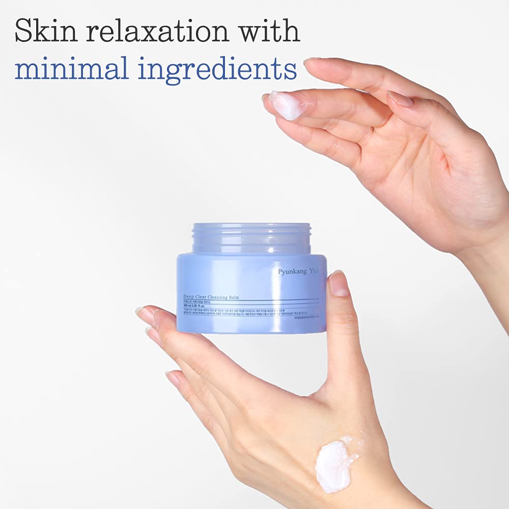 Pyunkang Yul 100ml next to hand to show true size and travel-friendly benefit