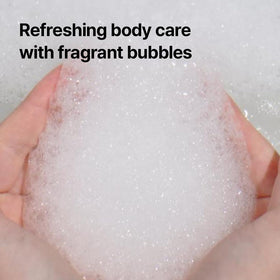 Pyunkang Yul bottle staged in bathtub, evokes calming shower routine and subtle scent