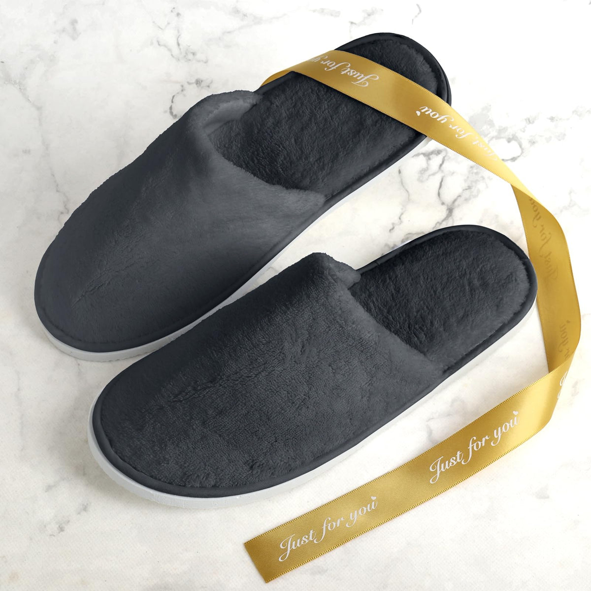 QatmMkt guest wearing slippers at home demonstrating clean, welcoming comfort