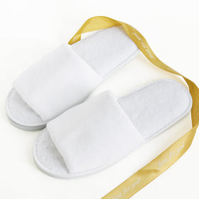 QatmMkt lifestyle guest wearing slippers demonstrating visitor comfort