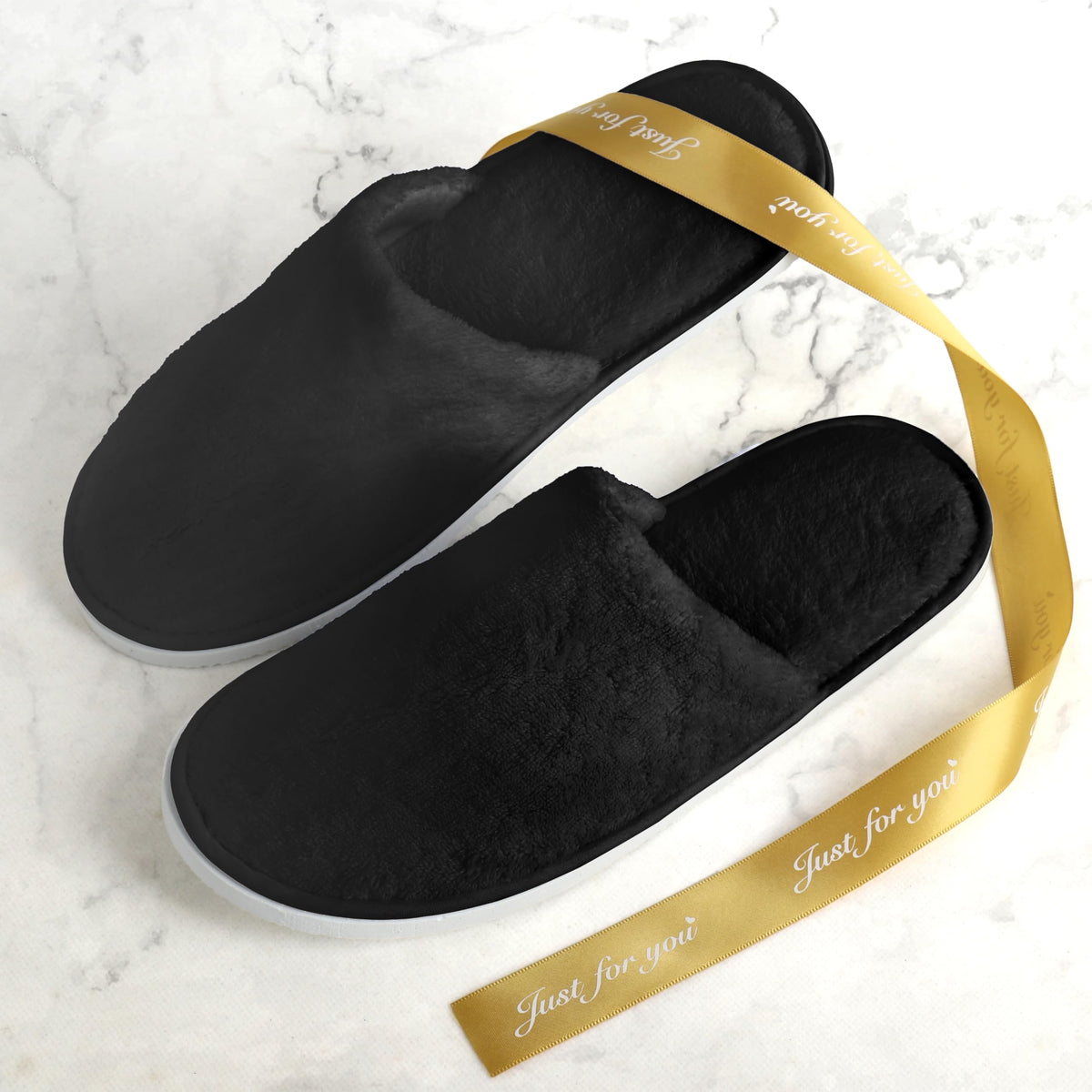 QatmMkt guest wearing slippers in living room for convenience