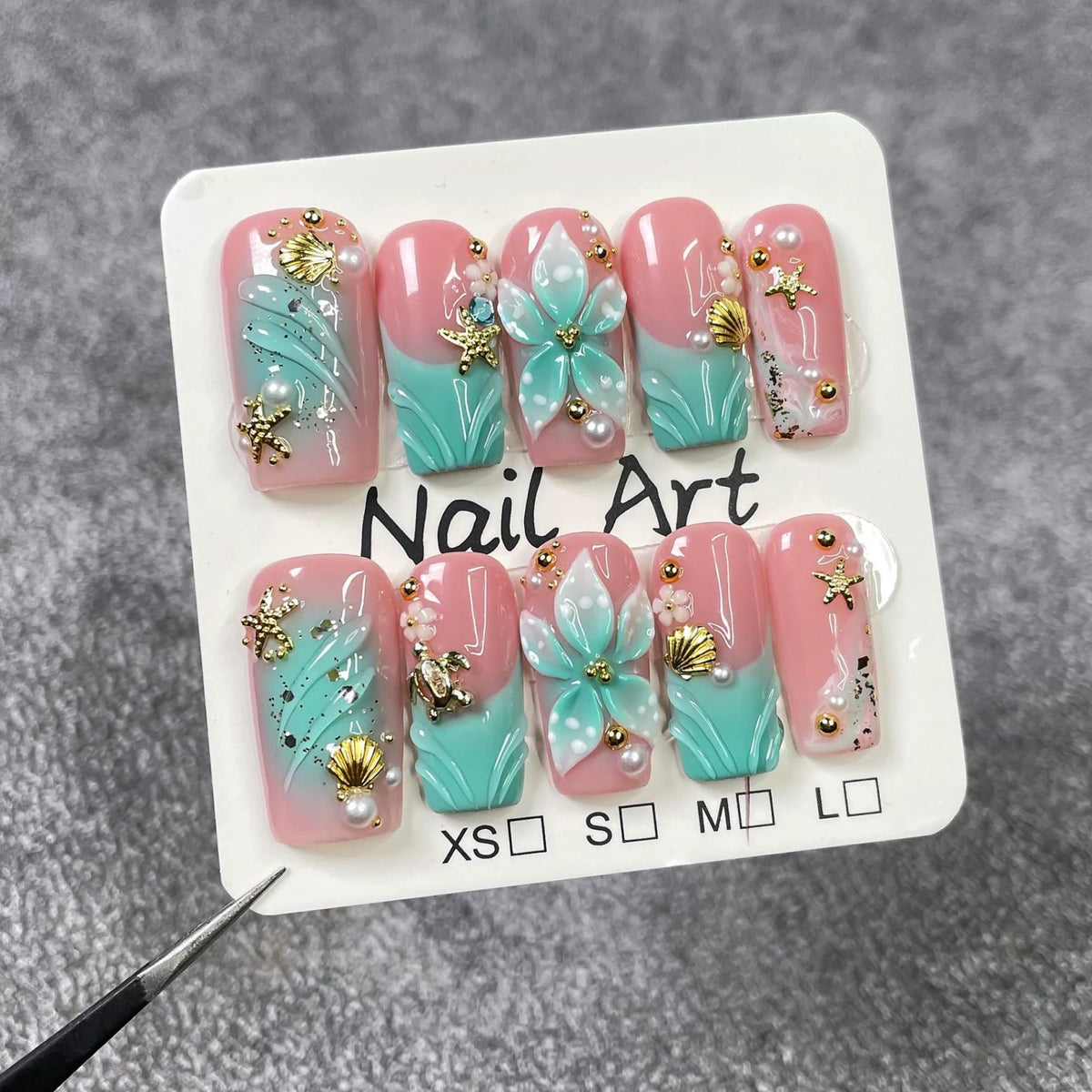 Qicaijia close-up showing 3D flower and rhinestone detail for elegance