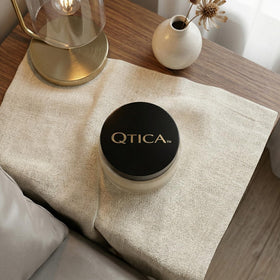 QTICA open jar close-up of dense buttery texture for precise application