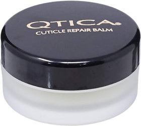QTICA front view of balm tin showing label and compact size, easy travel repair